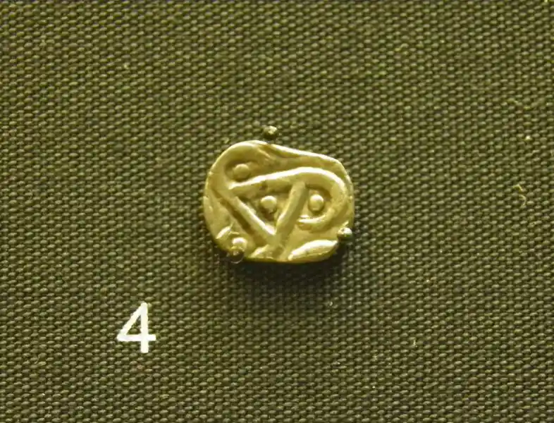 Triskele design on a coin in trade